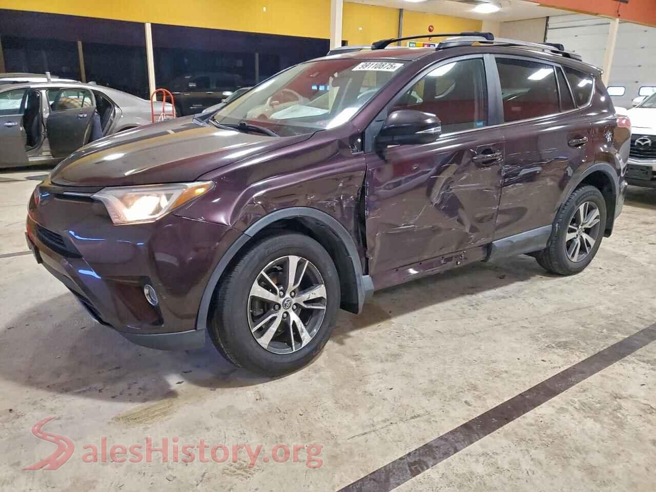 2018 TOYOTA RAV4 — VIN 2T3RFREV5JW823857