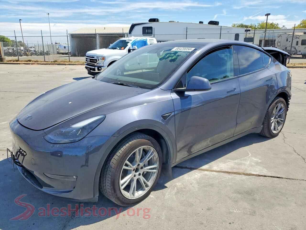 2023 TESLA MODEL Y — VIN 7SAYGAEE0PF738551