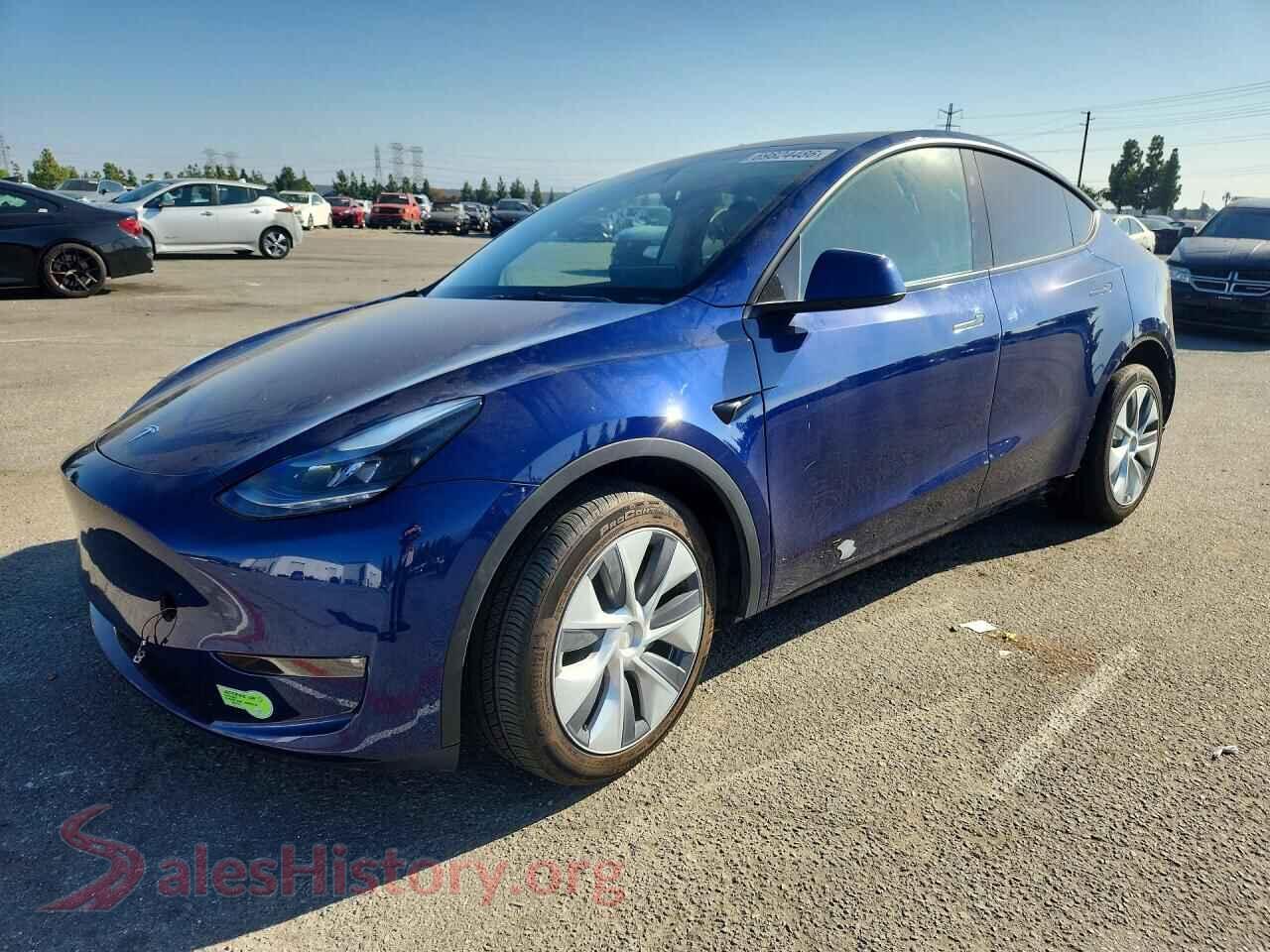 2023 TESLA MODEL Y — VIN 7SAYGAEE7PF858699
