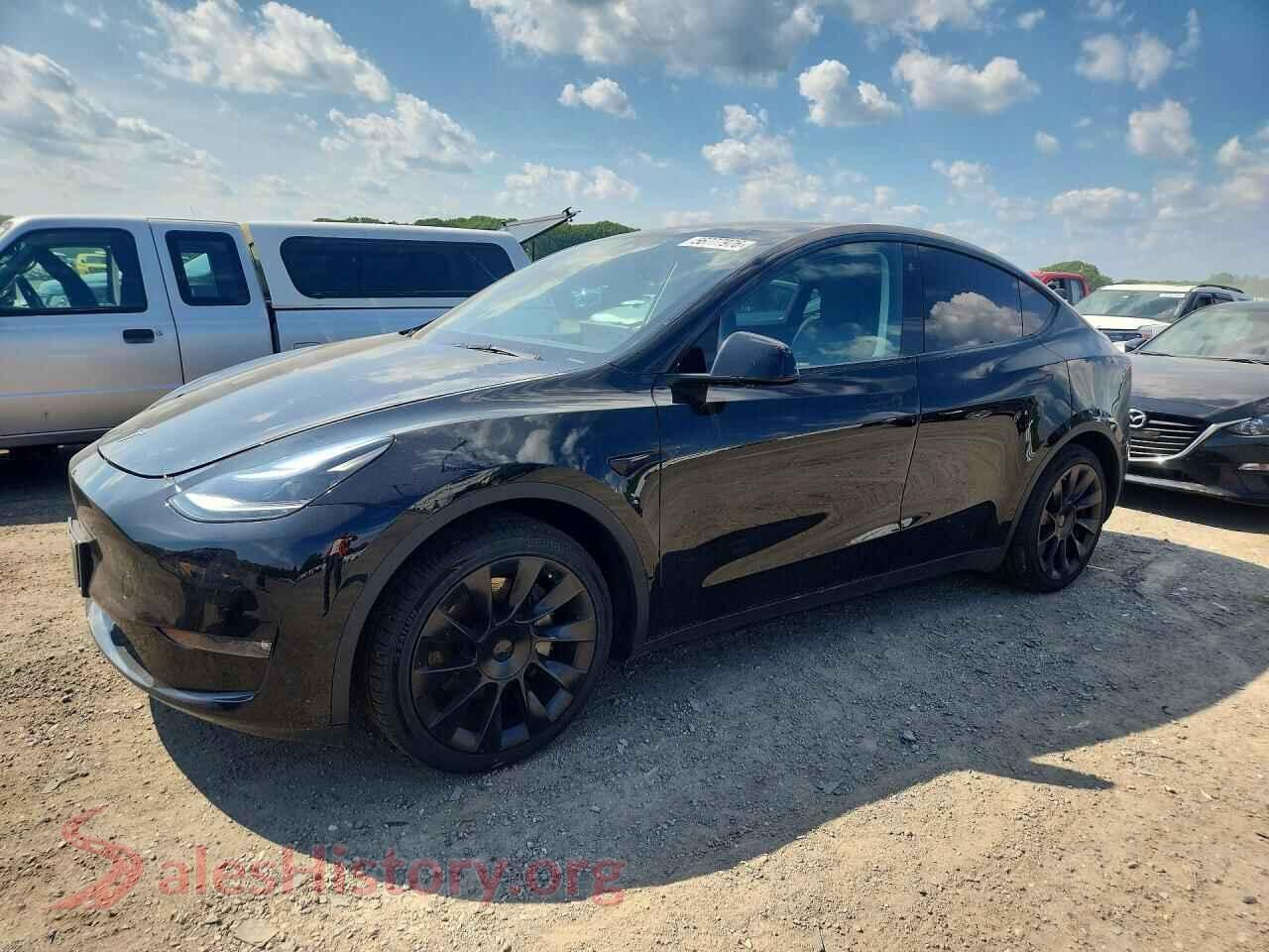 2023 TESLA MODEL Y — VIN 7SAYGAEE8PF752102