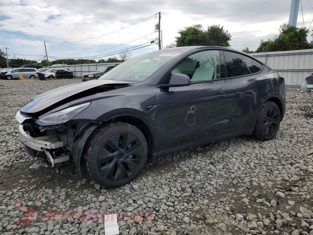 2025 TESLA MODEL Y — VIN 7SAYGAEE9SF294644