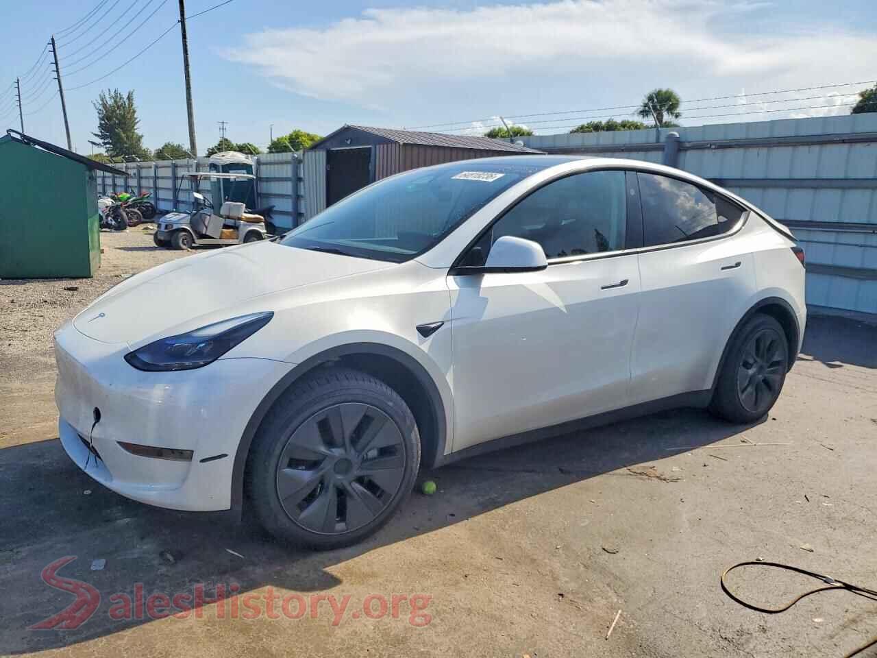 2025 TESLA MODEL Y — VIN 7SAYGDED9SA377402