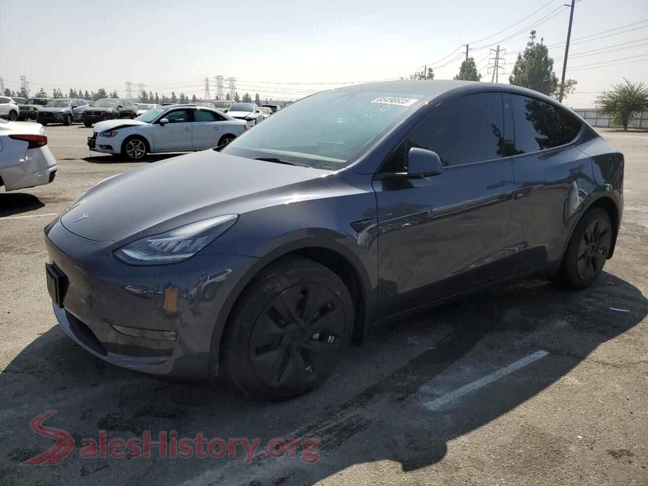 2023 TESLA MODEL Y — VIN 7SAYGDEE0PA085234