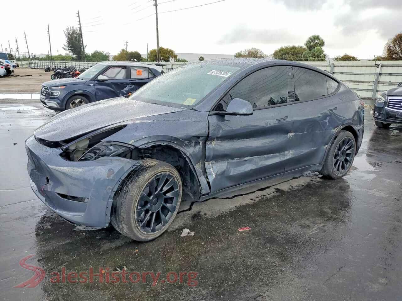 2023 TESLA MODEL Y — VIN 7SAYGDEE0PA099215