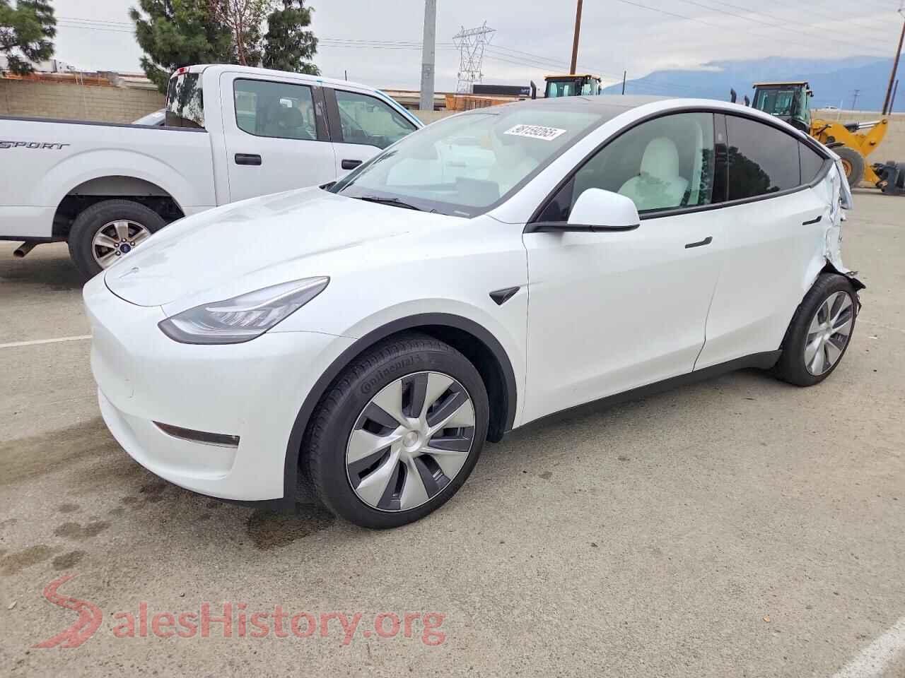 2023 TESLA MODEL Y — VIN 7SAYGDEE0PA153306