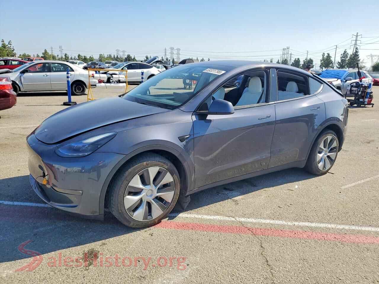 2023 TESLA MODEL Y — VIN 7SAYGDEE0PF637835