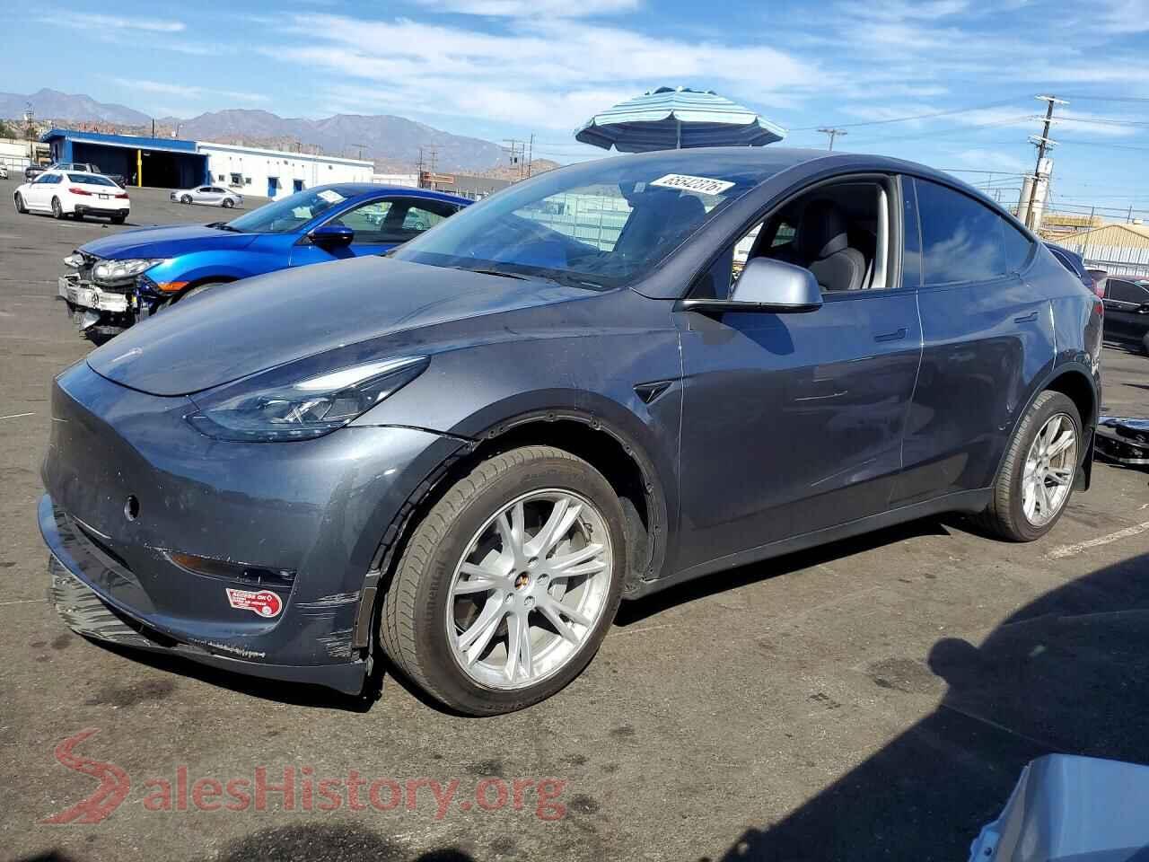 2023 TESLA MODEL Y — VIN 7SAYGDEE1PF877928