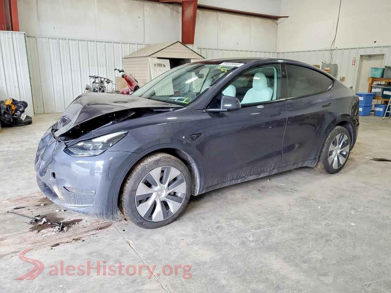 2023 TESLA MODEL Y — VIN 7SAYGDEE2PF838670
