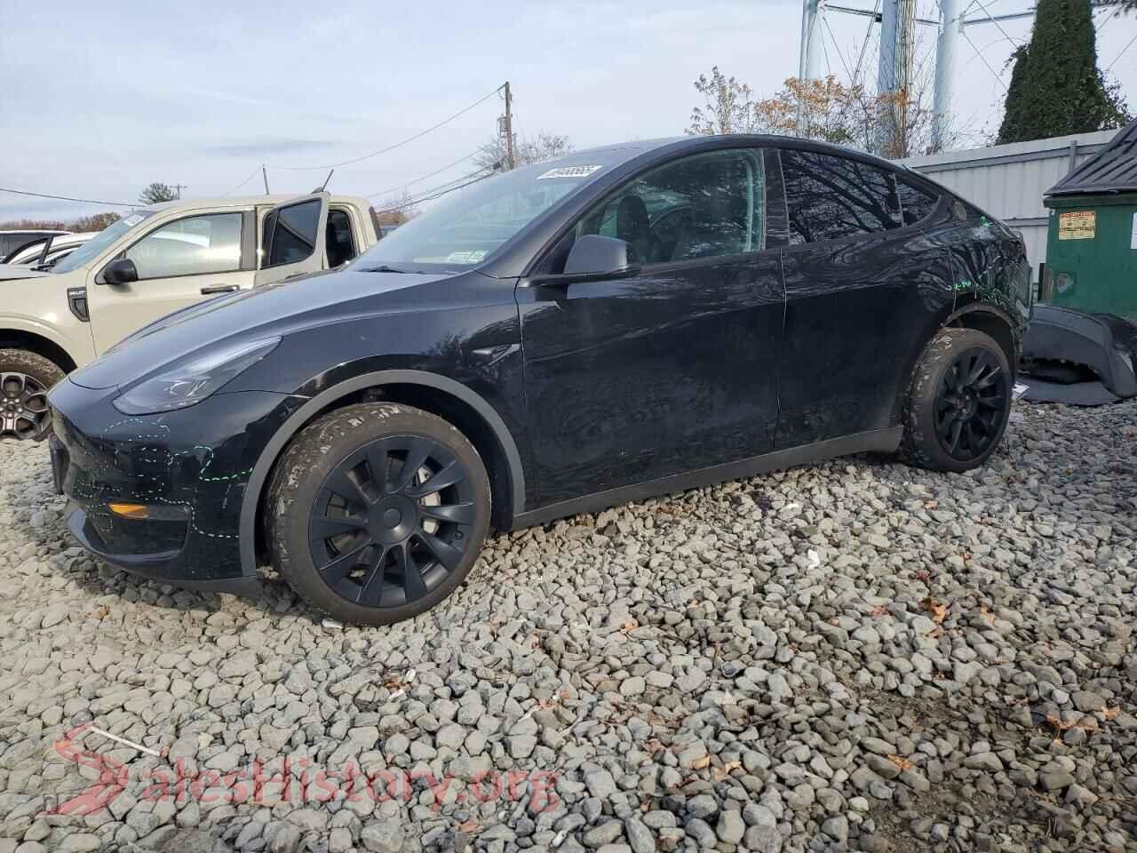 2023 TESLA MODEL Y — VIN 7SAYGDEE3PA180029