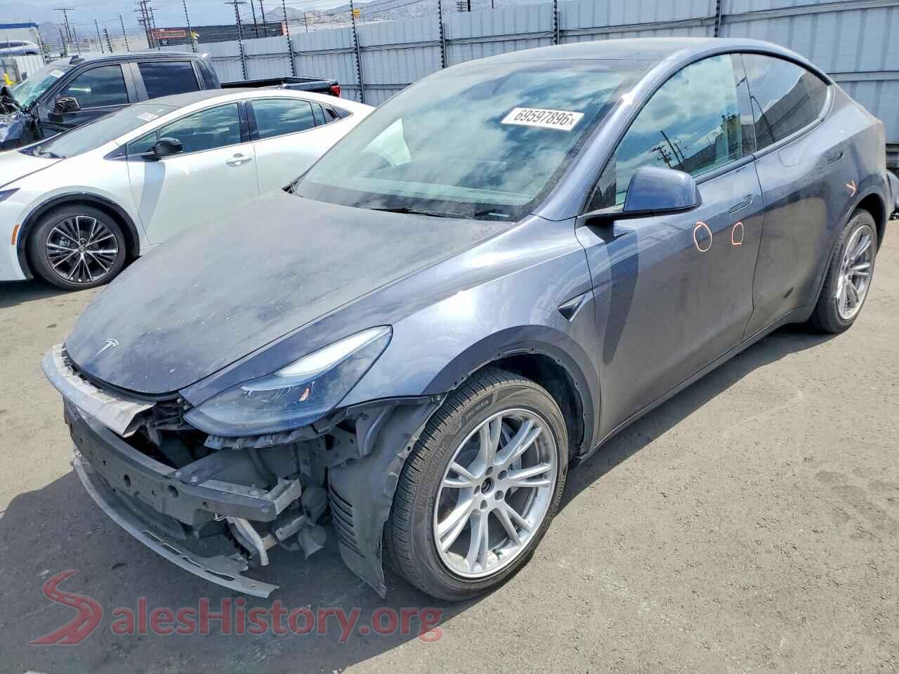 2023 TESLA MODEL Y — VIN 7SAYGDEE4PA211224
