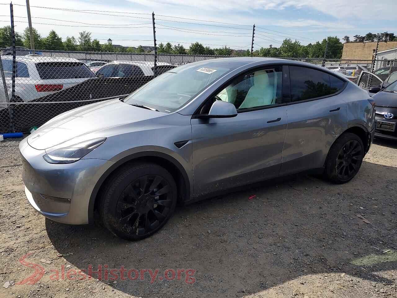 2024 TESLA MODEL Y — VIN 7SAYGDEE4RA332449