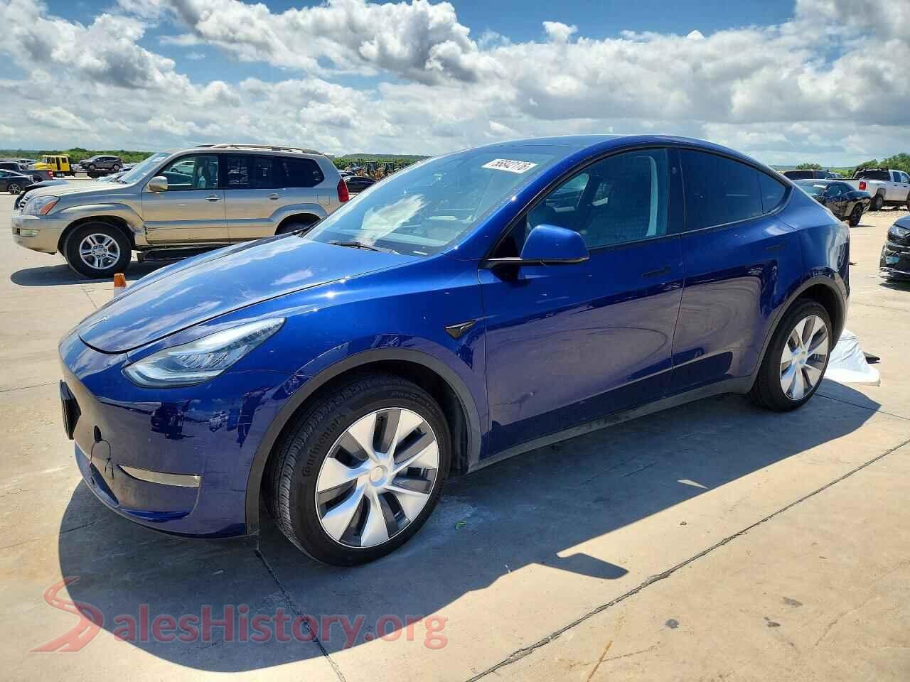2023 TESLA MODEL Y — VIN 7SAYGDEE6PA148160