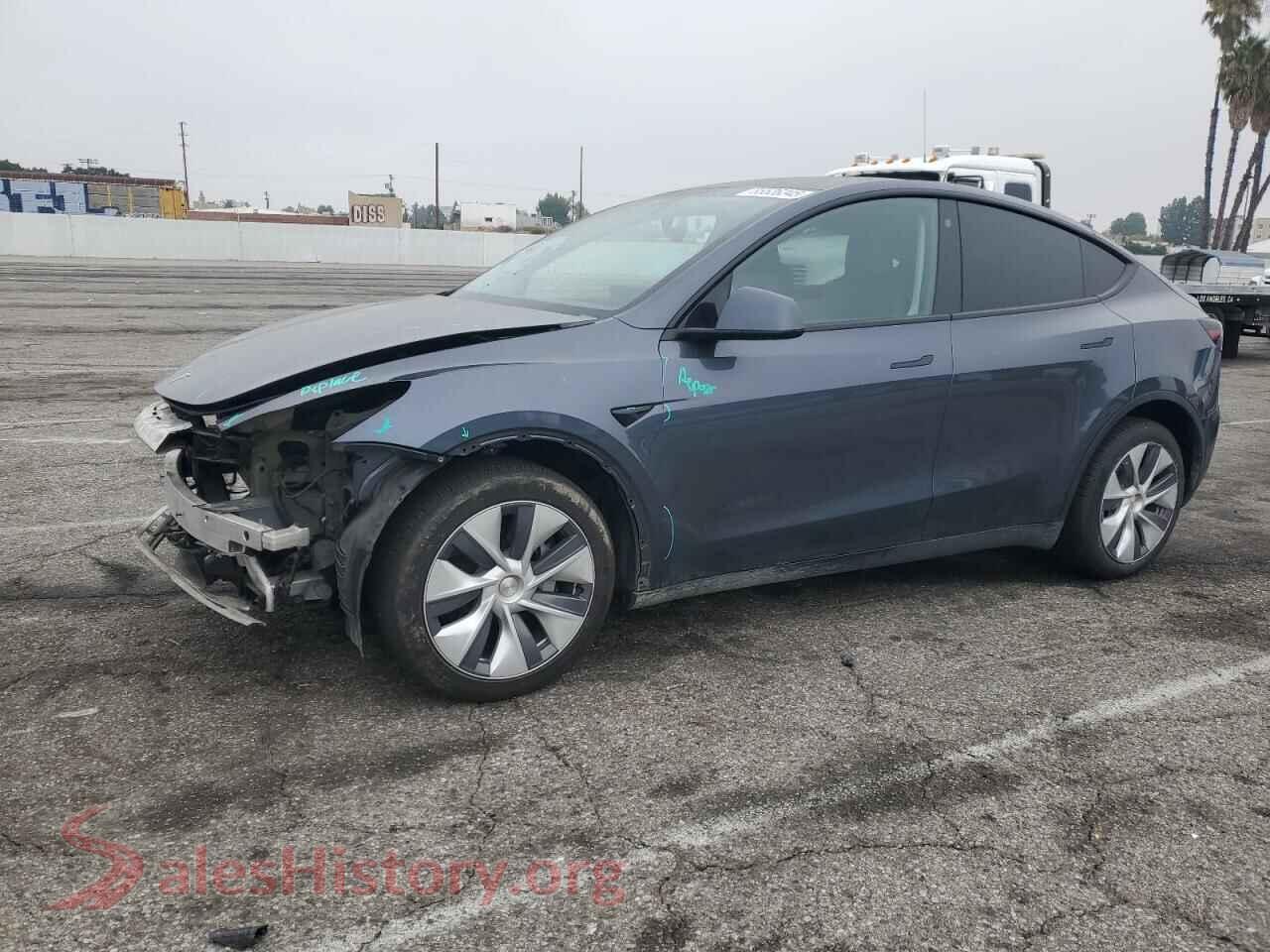 2023 TESLA MODEL Y — VIN 7SAYGDEE9PA113449
