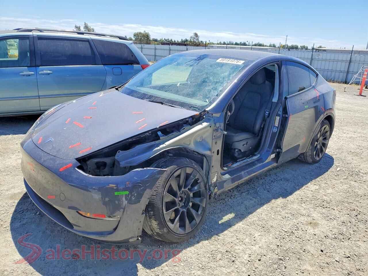 2023 TESLA MODEL Y — VIN 7SAYGDEE9PF928897