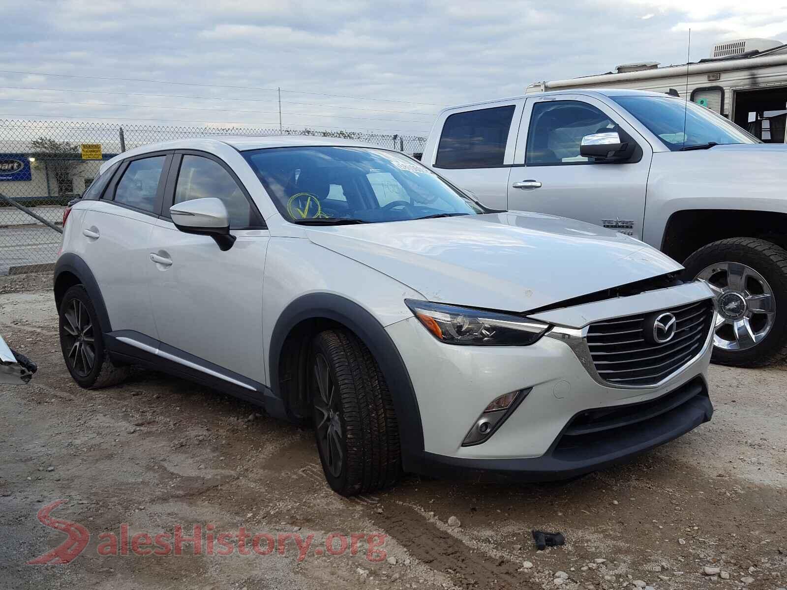 2016 MAZDA CX-3 — VIN JM1DKBD7XG0123877