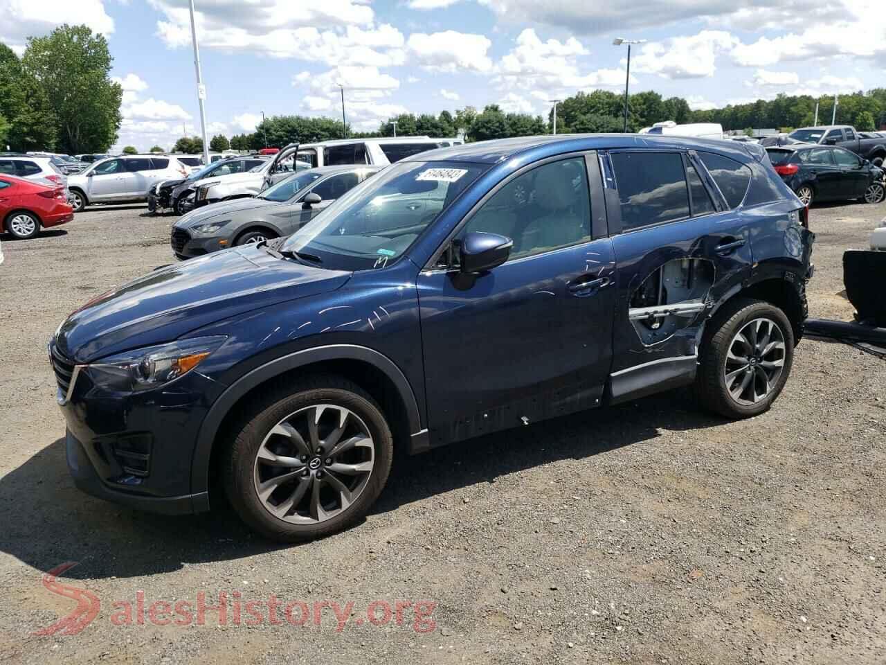 2016 MAZDA CX-5 — VIN JM3KE4DY0G0897971