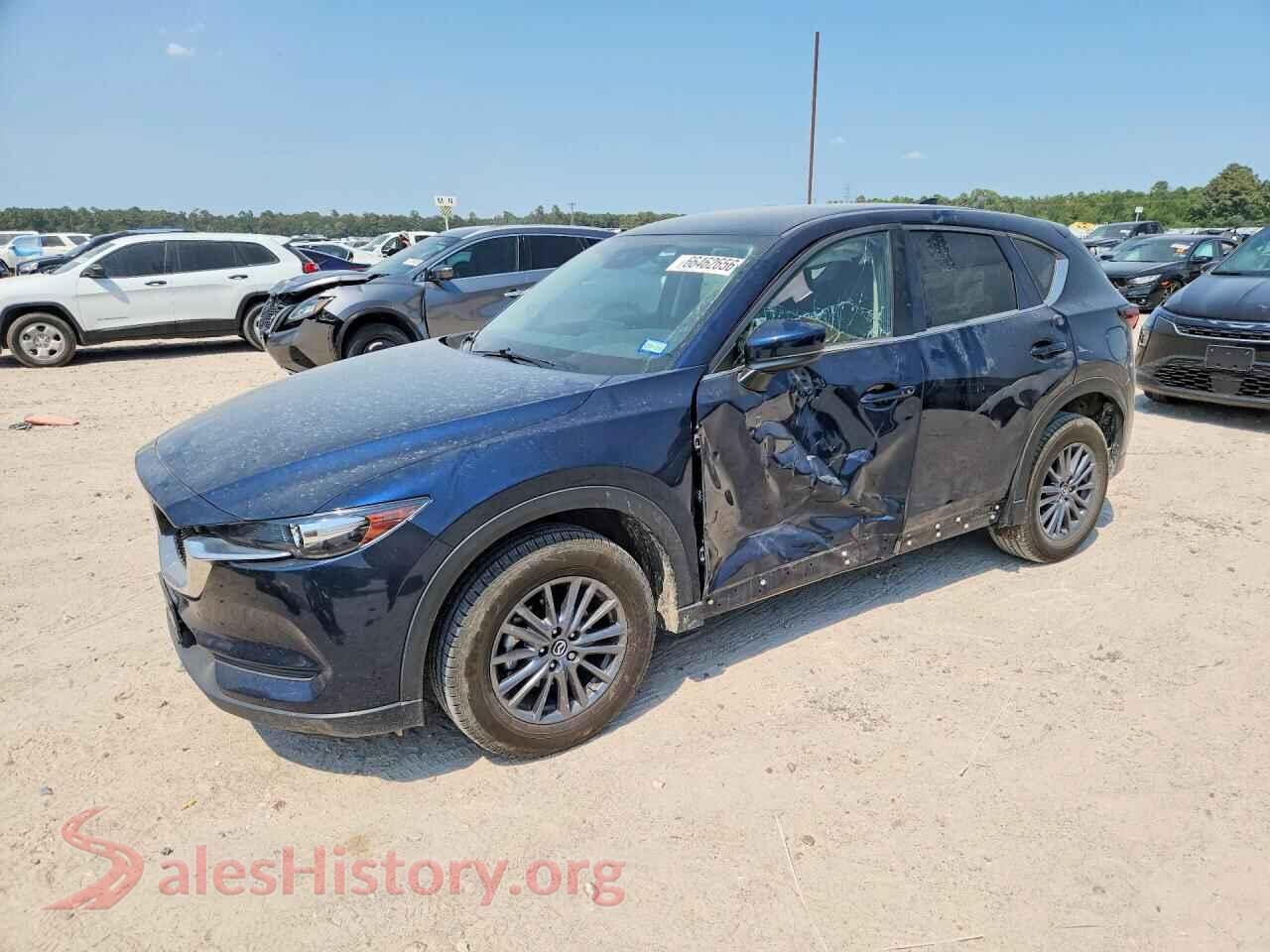 2021 MAZDA CX-5 — VIN JM3KFACM7M0445621