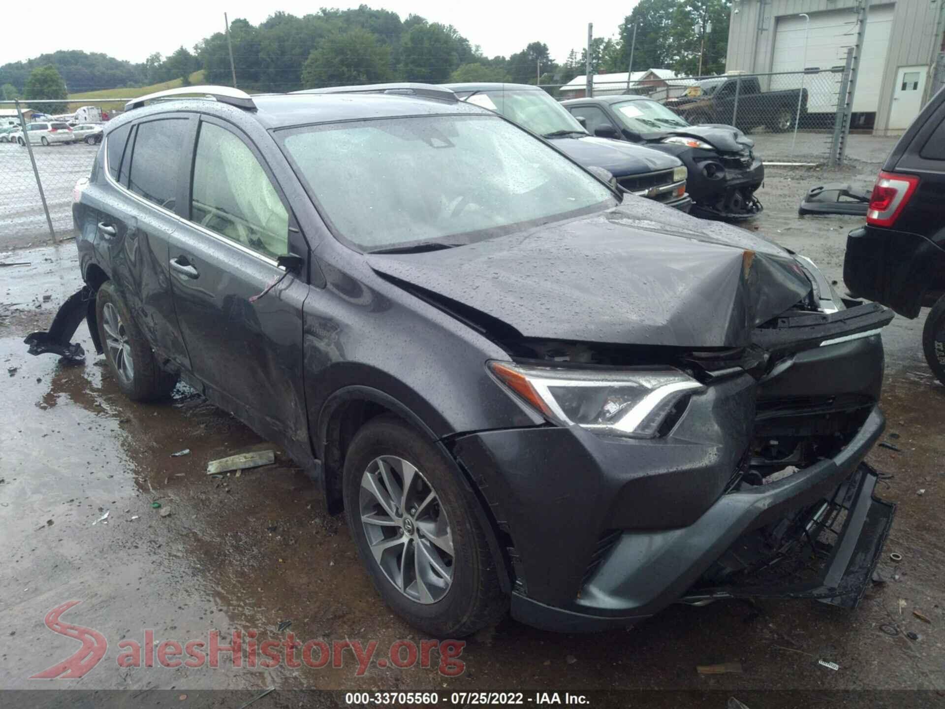 2018 TOYOTA RAV4 — VIN JTMRJREV8JD258094